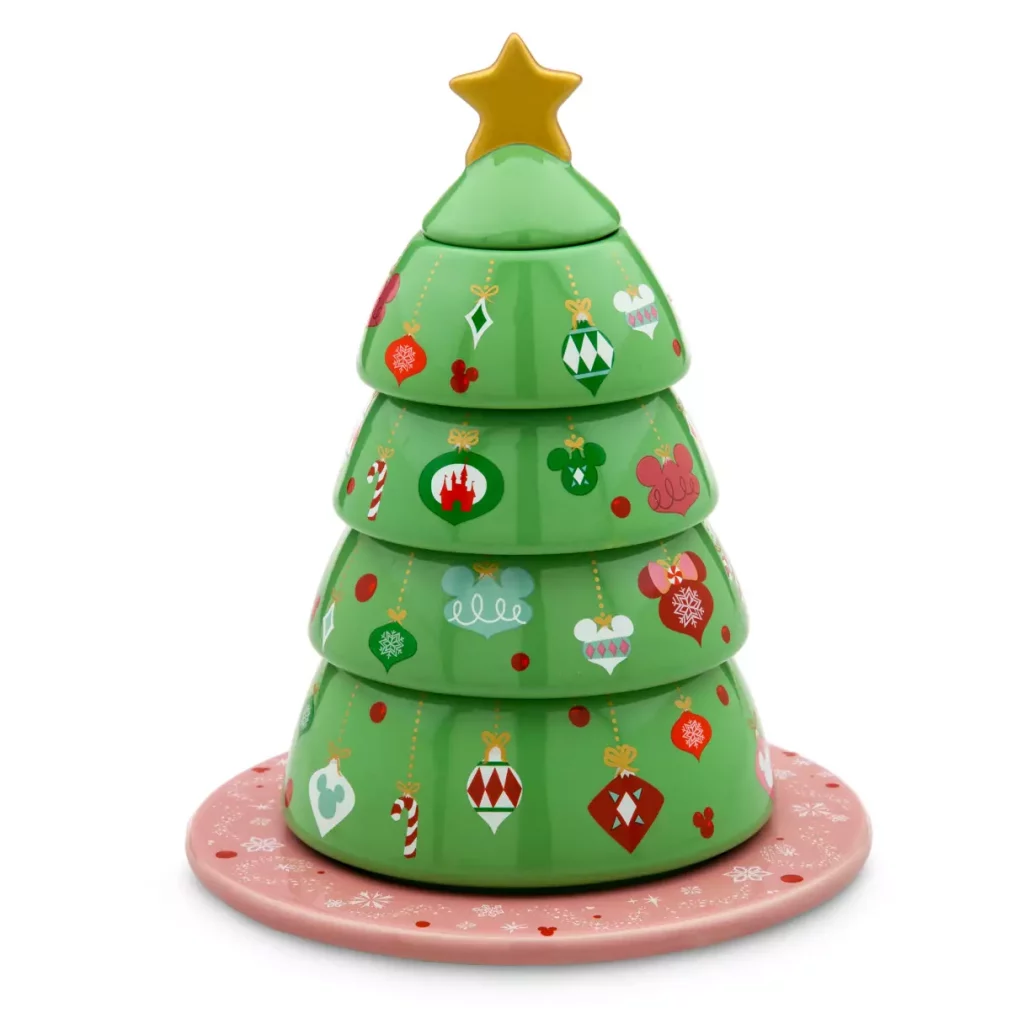 A green ceramic Christmas tree with green and red Mickey and Minnie mouse Christmas icons and ornaments