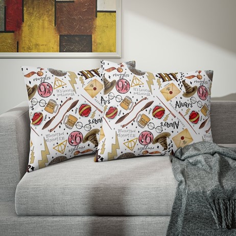 Pillowcase with a number of small designs related to the Harry Potter franchise