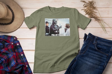 A graphic t-shirt with Darth Vader pointing at Princess Liea with the text "Pull my finger"